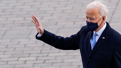 U.S. President Joe Biden waves as he departs after the 59th Presidential Inauguration in Washington, DC, U.S. January 20, 2021.