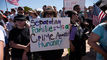 People participate in a protest against a recent U.S. immigration policy of separating children from their families when they enter the United States as undocumented immigrants,