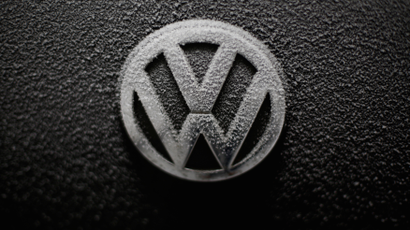 VW logo on car with snowflakes.