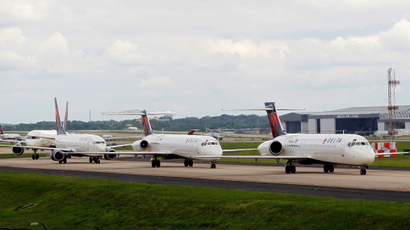 Delta airplanes line up on the taxi way after Delta Air Lines' computer systems crashed on Monday, grounding flights around the globe, at Hartsfield Jackson Atlanta International Airport in Atlanta, Georgia, U.S. August 8, 2016.