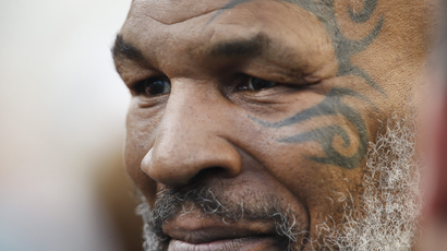 A recent close up of Mike Tyson with his facial tattoos prominent.