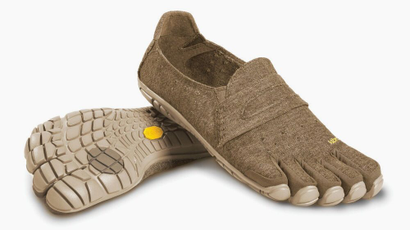 A photo of Vibram's hemp five-toed shoes, which have rubber caps at each toe and a seam as if for penny loafers.