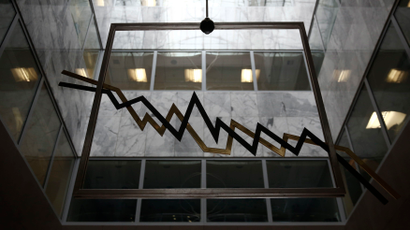 A metal sculpture depicting a stock exchange chart is seen in the reception hall of the Athens Bourse in Athens September 11, 2014. Greece on Thursday set the pricing on its offer to top up its recent three- and five-year bonds by about 1 billion euros (US$1.3 billion) and exchange them for outstanding T-bills instead of cash. REUTERS/Yorgos Karahalis (GREECE - Tags: POLITICS BUSINESS)