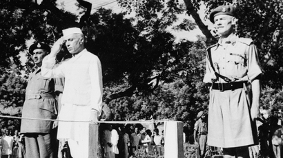 Jawaharlal Nehru salutes the flag as he becomes independent India's first prime minister on August 15, 1947 during the Independence Day ceremony at Red Fort, New Delhi, India.