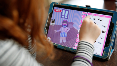 A child uses the Roblox platform to manipulate virtual items
