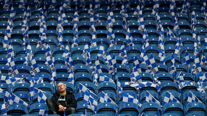 A Chelsea fan sits in the stands before the Europa League final soccer match against Benfica at the Amsterdam Arena May 15, 2013. REUTERS/Eddie Keogh (NETHERLANDS - Tags: SPORT SOCCER) - RTXZNOL