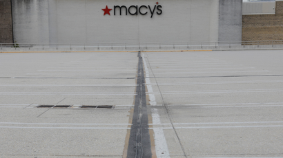 A Macy's department store stands behind an empty parking lot at King of Prussia Mall