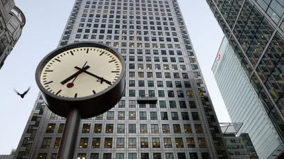 A clock in Canary Wharf at 7:20