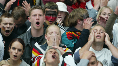 German soccer fans react after Ronaldo scored Brazil's 1-0 against Germany in the World Cup Finals in Japan.