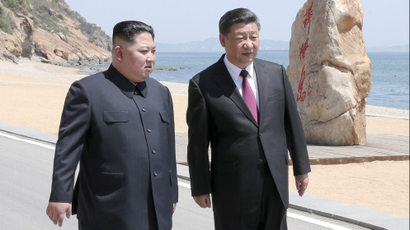 Chinese President Xi Jinping and North Korean leader Kim Jong Un meet in Dalian, Liaoning province, China in this picture released by Xinhua on May 8, 2018.