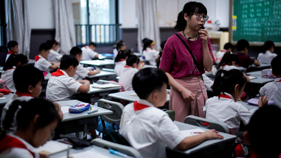Students are pictured during a Chinese class at Changchun Street Primary School of Wuhan during a government-organized media tour following the coronavirus disease (COVID-19) outbreak, in Wuhan, Hubei province, China, September 4, 2020.