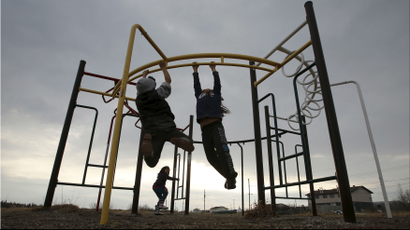 Children playing on a playground.