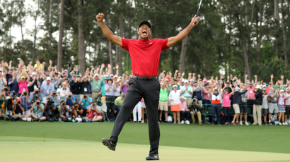 Tiger Woods of the U.S. celebrates on the 18th hole to win the 2019 Masters