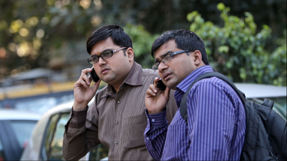 indian men on phones