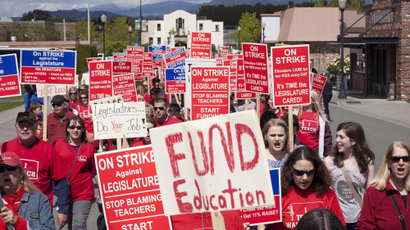 Teachers protesting funding cuts