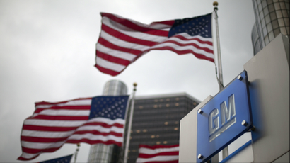 American flags fly at GM's headquarters in Detroit