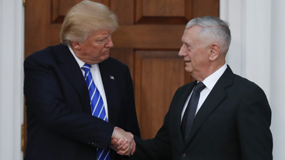 President-elect Donald Trump shakes hands with retired Marine Corps Gen. James Mattis