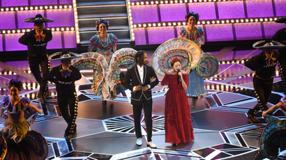 Miguel, left, and Natalia Lafourcade perform "Remember Me" from "Coco" at the Oscars