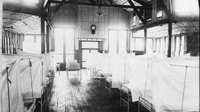 Interior of Hospital during the influenza epidemic. The beds are isolated by curtains