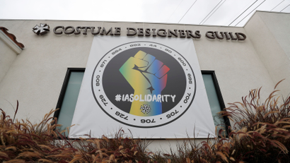 A banner shows support for IATSE union effort