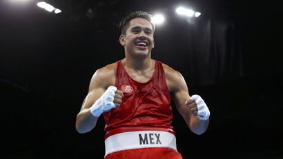 Misael Rodriguez of Mexico celebrates after winning his bout.