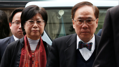 Former Hong Kong Chief Executive Donald Tsang, his wife Selina and son Thomas, arrive at the High Court in Hong Kong, China February