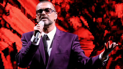 British singer George Michael performs on stage during his "Symphonica" tour concert in Vienna September 4, 2012