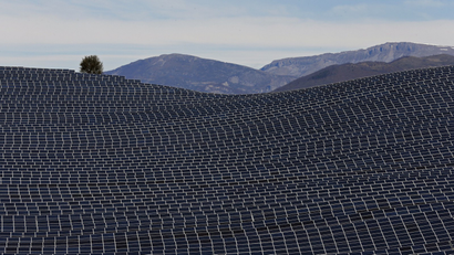 A general view shows solar panels to produce renewable energy at the photovoltaic park in Les Mees, in the department of Alpes-de-Haute-Provence, southern France March 31, 2015.