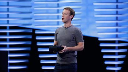 Facebook CEO Mark Zuckerberg during the keynote address at the F8 Facebook Developer Conference Tuesday, April 12, 2016, in San Francisco. Facebook says people who use its Messenger chat service will soon be able to order flowers, request news articles and talk with businesses by sending them direct text messages. At its annual conference for software developers, Zuckerberg said the company is releasing new tools that businesses can use to build "chat bots," or programs that talk to customers in conversational language. (AP Photo/Eric Risberg)