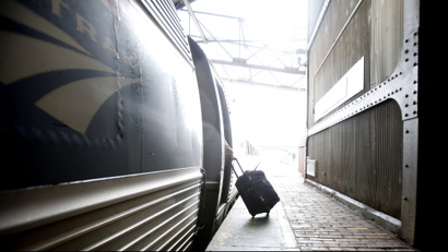 Luggage boarding a train