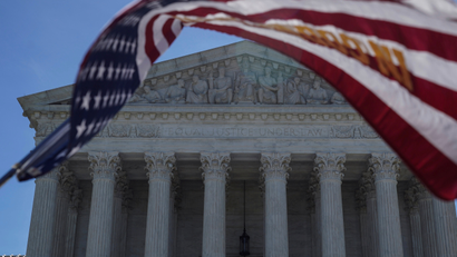 Supreme Court and US flag.