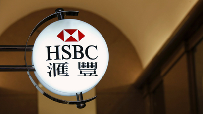 HSBC's logo is displayed inside an office tower in Hong Kong.