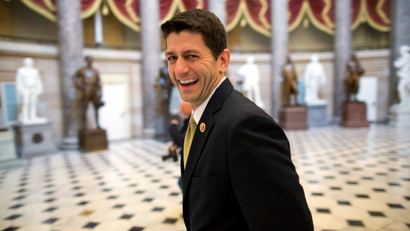 FILE - In this Oct. 11, 2013, photo, House Budget Committee chairman Rep. Paul Ryan, R-Wis., laughs as he walks to his office on Capitol Hill in Washington. Forget a grand bargain. Reaching even a small budget deal will be a challenge when negotiators start meeting in an effort to salvage any kind of agreement in the aftermath of this month’s shutdown debacle and debt limit crisis. "If we focus on some big, grand bargain then we’re going to focus on our differences and both sides are going to require that the other side compromises some core principle and then we’ll get nothing done," Ryan, said in an interview on Oct. 24.