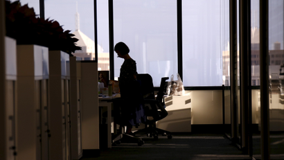 An employee of software company Nuix stands in their office located in central Sydney, Australia