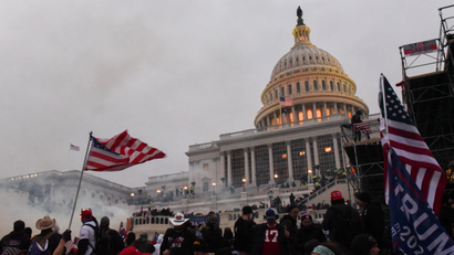 Police clear the U.S. Capitol Building with tear gas as supporters of U.S. President Donald Trump gather outside, in Washington, U.S. January 6, 2021.