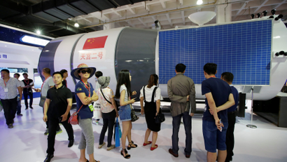 A model of Tiangong 2 space laboratory by China Aerospace Science and Technology Corporation is displayed at China Beijing International High-tech Expo in Beijing