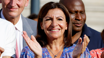 Paris Mayor Anne Hidalgo seen applauding at a public event