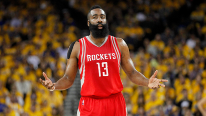 Apr 18, 2016; Oakland, CA, USA; Houston Rockets guard James Harden (13) reacts after the Rockets made a three point basket against the Golden State Warriors in the first quarter in game two of the first round of the NBA Playoffs at Oracle Arena. Mandatory Credit: Cary Edmondson-USA TODAY Sports