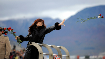 Argentine President Cristina Fernandez de Kirchner throws flowers into the Bahia de Ushuaia (Ushuaia Bay) waters to pay homage to the fallen soldiers during the Falklands War in Ushuaia April 2, 2012. April 2 marks the 30th anniversary of the war over the Falkland islands, known commonly in Argentina as "Las Malvinas". Thirty years after Britain and Argentina went to war over the Falklands, relations are at their chilliest in years as Buenos Aires launches a multi-pronged diplomatic offensive to assert its claim to sovereignty over the South Atlantic islands.