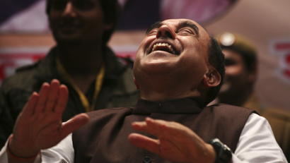 Subramanian Swamy laughs during a seminar against corruption in New Delhi