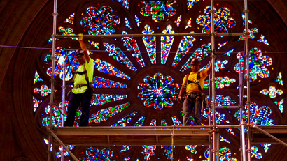 Construction workers repair National Cathedral in Washington DC.