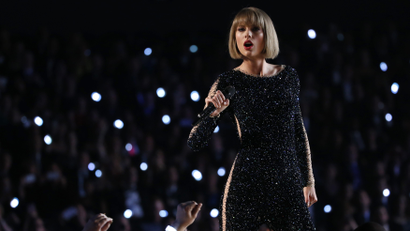 Taylor Swift performs "Out of the Woods" at the 58th Grammy Awards in Los Angeles