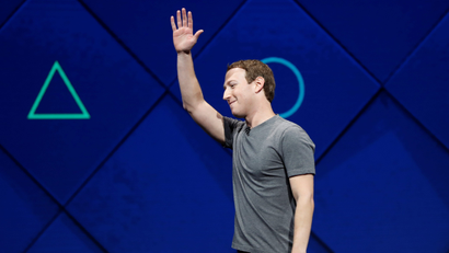 Mark Zuckerberg waving