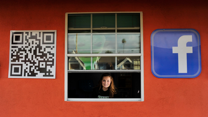 Sarah Hostetler looks out from her home in Buena Park, California
