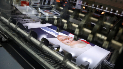Official portraits of US president Donald Trump are printed at the Government Publishing Office in Washington