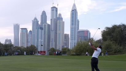 Man plays golf in Dubai