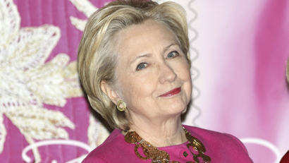 Hillary clinton in a pink jacket