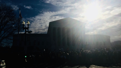 SCOTUS obscured by sun.