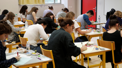 High school students start working on a 4 hours philosophy dissertation, that kicks off the French general baccalaureat exam at the lycee La Bruyere in Versailles