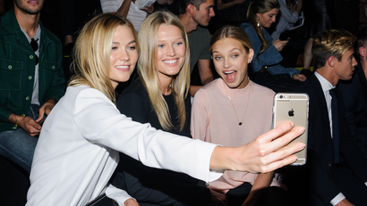 Karlie Kloss, Toni Garrn, and Romee Strijd take a selfie.